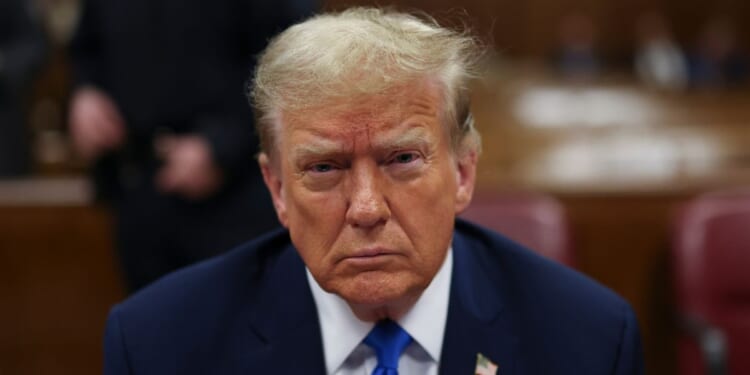 Former President Donald Trump awaits the start of proceedings during jury selection at Manhattan criminal court in New York City on Thursday.