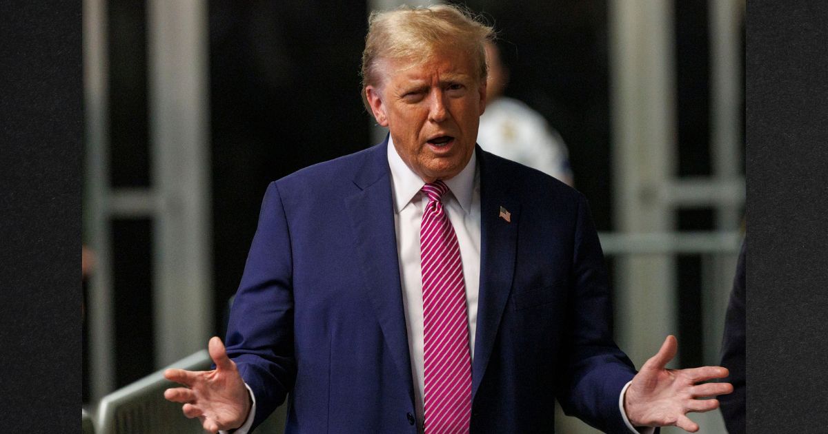 Former President Donald Trump speaks to the media as he exits the Manhattan Criminal Court Friday during his trial for allegedly covering up hush money payments.