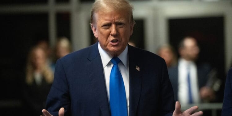 Former President Donald Trump speaks to the media at the end of the day at Manhattan Criminal Court in New York City on Monday.