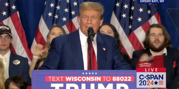 Former President Donald Trump addresses supporters Tuesday in Green Bay, Wisconsin.