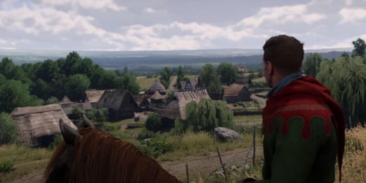 A character looking over a small town in the upcoming video game "Kingdom Come: Deliverance II."