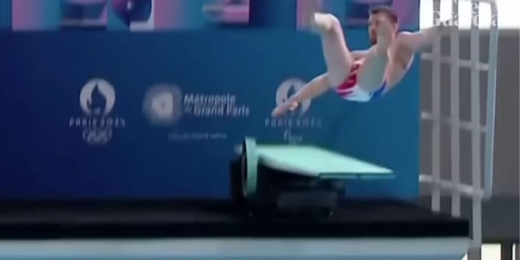 diver Alexis Jandard slipping on a diving board