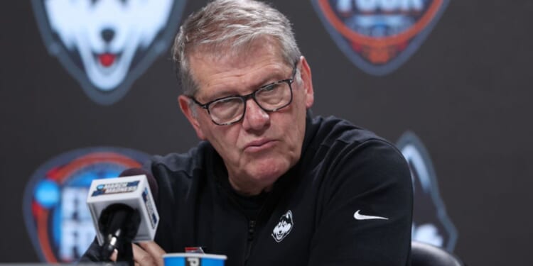 Head coach Geno Auriemma of the UConn Huskies speaks with the media after losing to the Iowa Hawkeyes in the NCAA Women's Basketball Tournament Final Four semifinal game Friday in Cleveland, Ohio. Iowa defeated Connecticut 71-69.