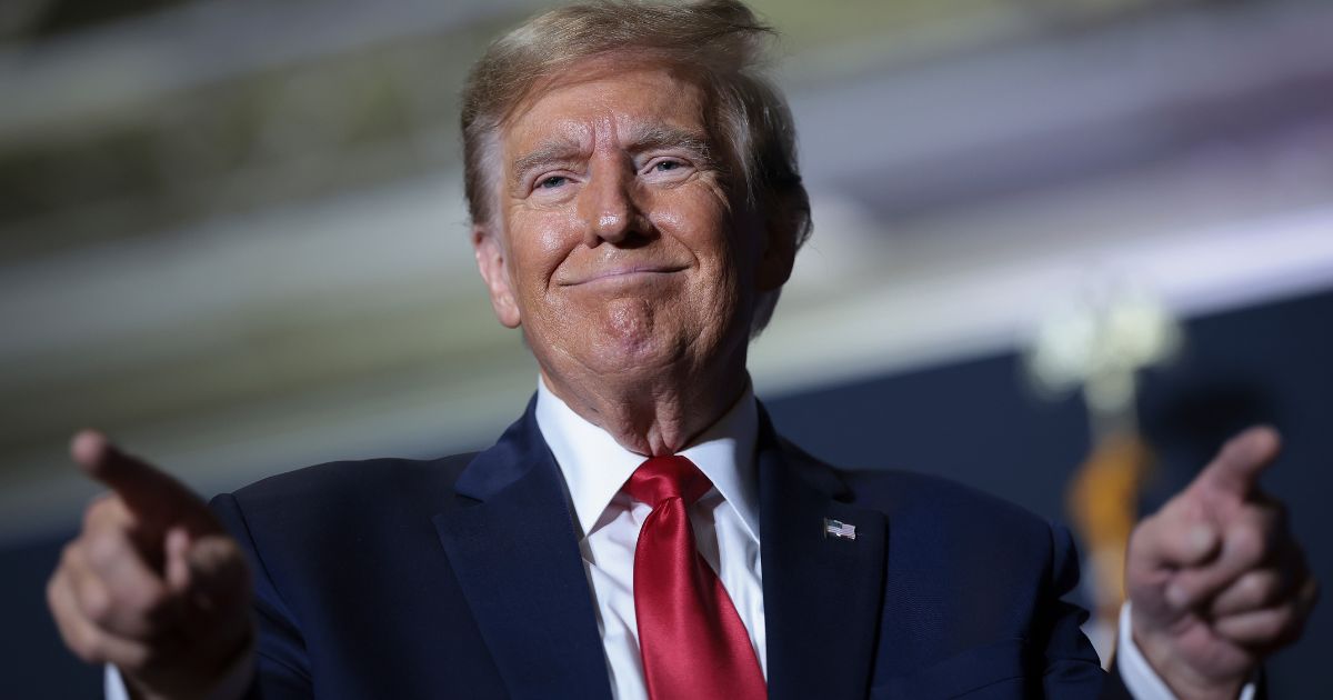 Former President Donald Trump gestures to supporters after speaking at a Get Out The Vote rally in North Charleston, South Carolina, on Feb. 14.