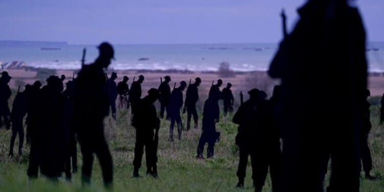 Standing with Giants installed 1,475 silhouettes along the British Normandy Memorial Grounds in Ver-Sur-Mer, France, to honor the British soldiers who died during the D-Day Invasion on the 80th anniversary.