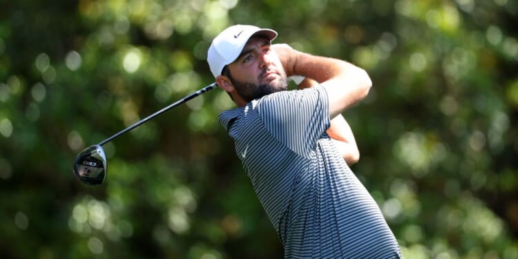 Scottie Scheffler hits a shot during a practice round prior to the 2024 Masters Tournament at Augusta National Golf Club in Augusta, Georgia, on Monday.