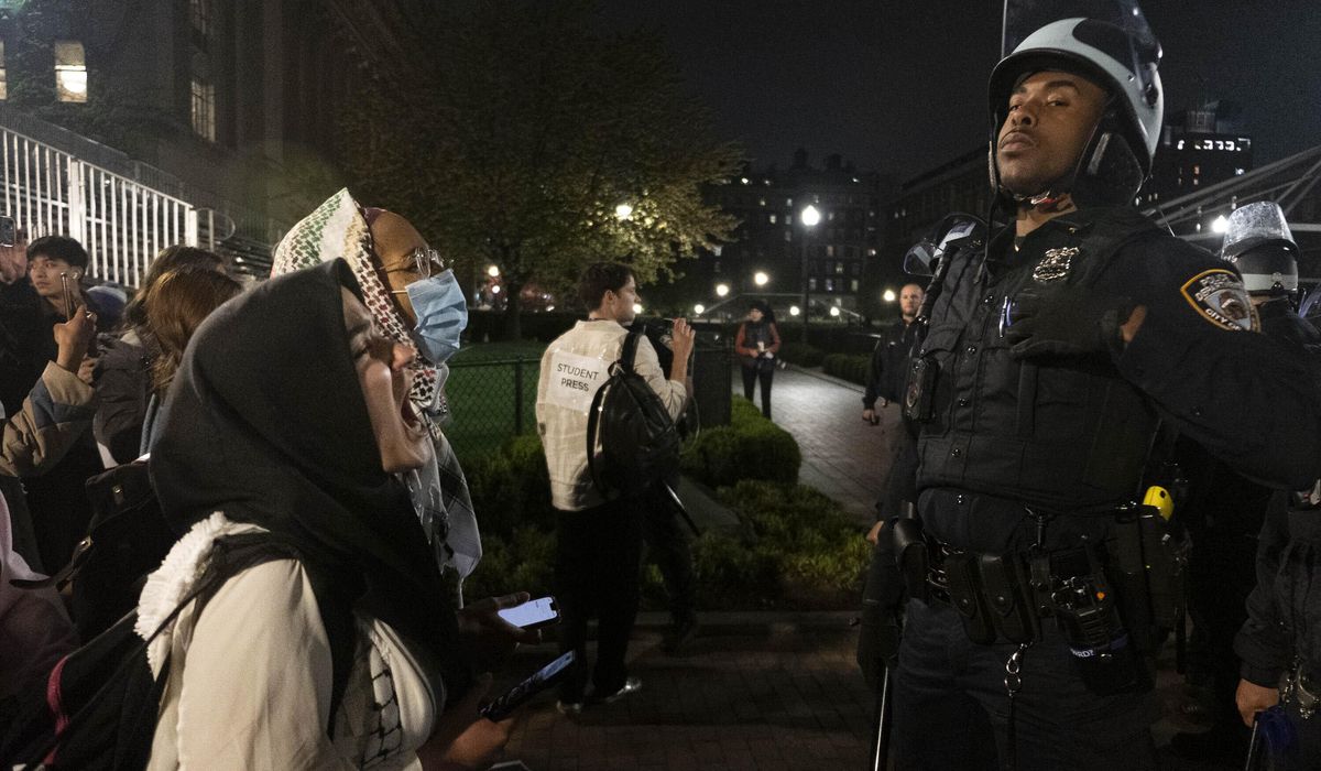 Joe Biden keeps quiet as Gaza protesters and police clash on college campuses