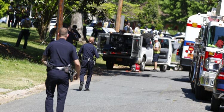 Biden meets with families of officers killed in Charlotte, North Carolina, shooting