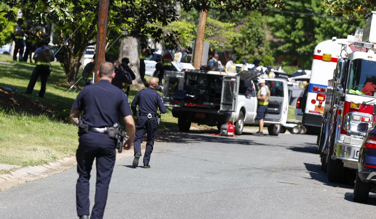 Biden meets with families of officers killed in Charlotte, North Carolina, shooting