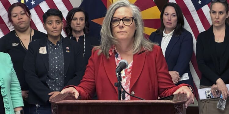 Katie Hobbs, Arizona governor, signs bill to repeal 1864 ban on most abortions