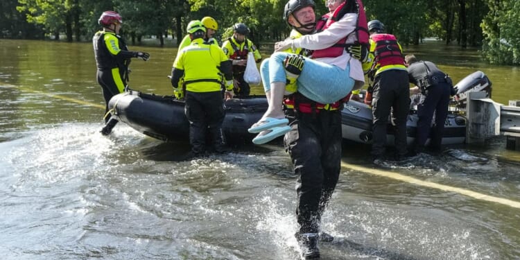 Torrential rains inundate southeastern Texas, causing flooding that has closed schools and roads