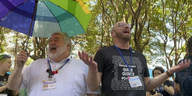 United Methodist delegates repeal church's ban on its clergy celebrating same-sex marriages