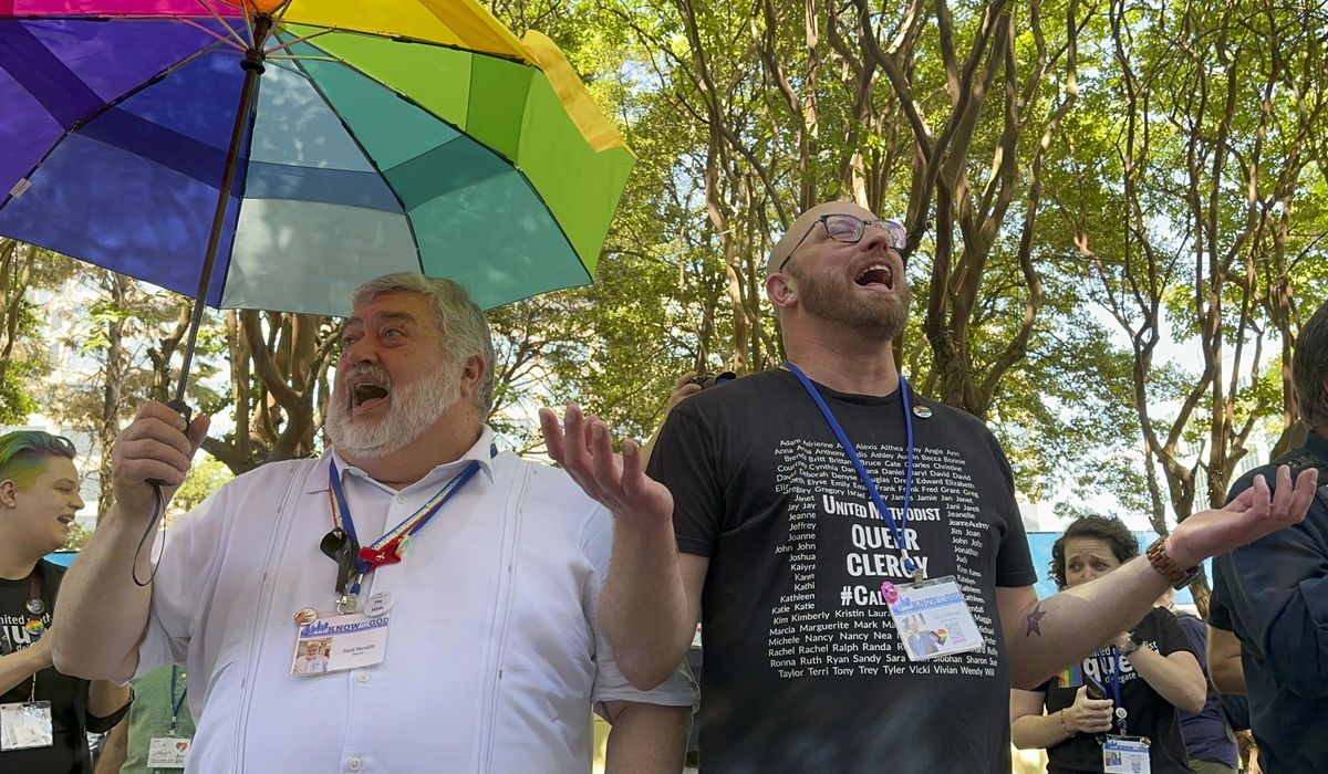 United Methodist delegates repeal church's ban on its clergy celebrating same-sex marriages