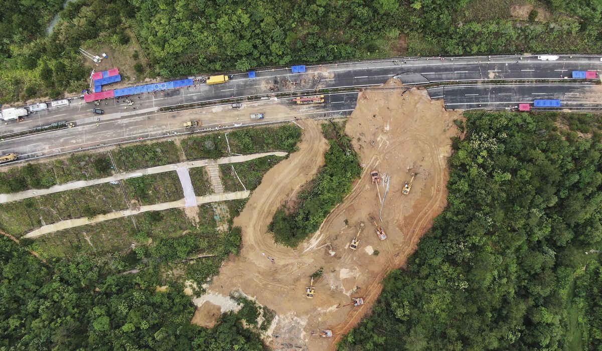 Chinese driver praised for helping reduce casualties in a highway collapse that killed 48