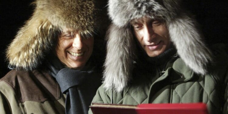 'An exceptional meal': Vladimir Putin cut out a deer's heart, presented it to Silvio Berlusconi