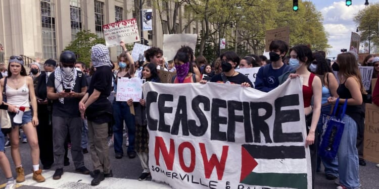 MIT pro-Palestinian protesters break through barricades to retake encampment