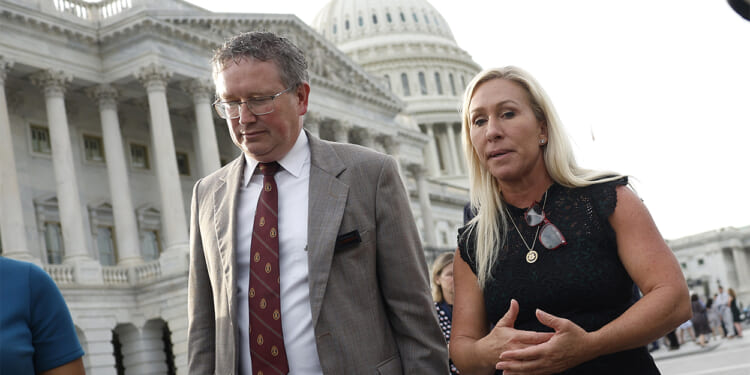 Rep. Marjorie Taylor Greene and Rep. Thomas Massie outside the US Capitol