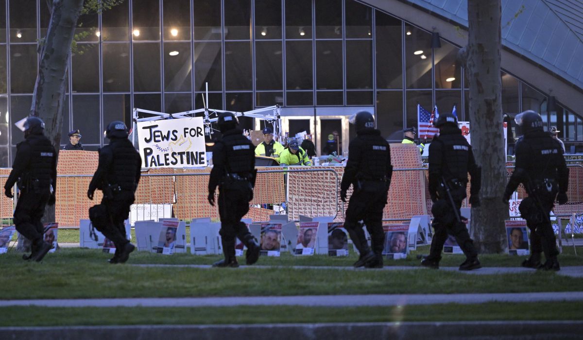 Police pull apart pro-Palestinian tent encampment at MIT