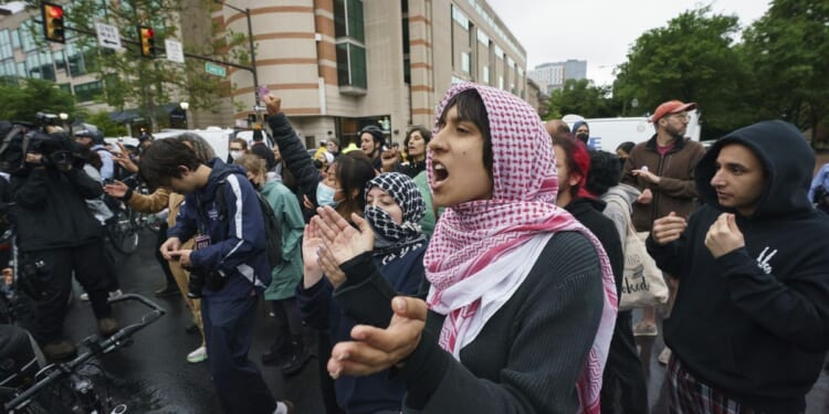 Police arrest dozens as they break up pro-Palestinian protests at several U.S. universities