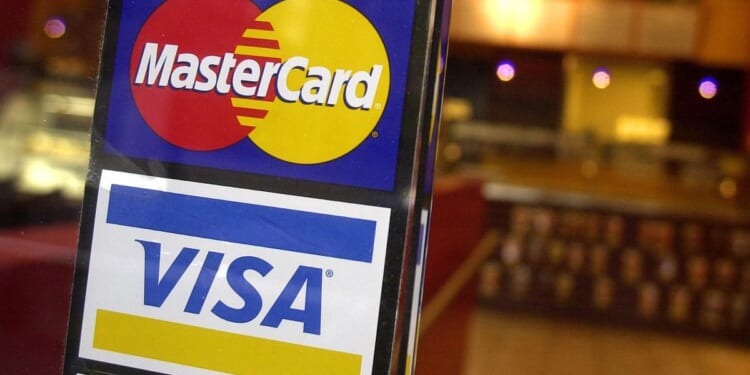 Federal judge temporarily halts Biden administration plan to lower credit card late fees to $8