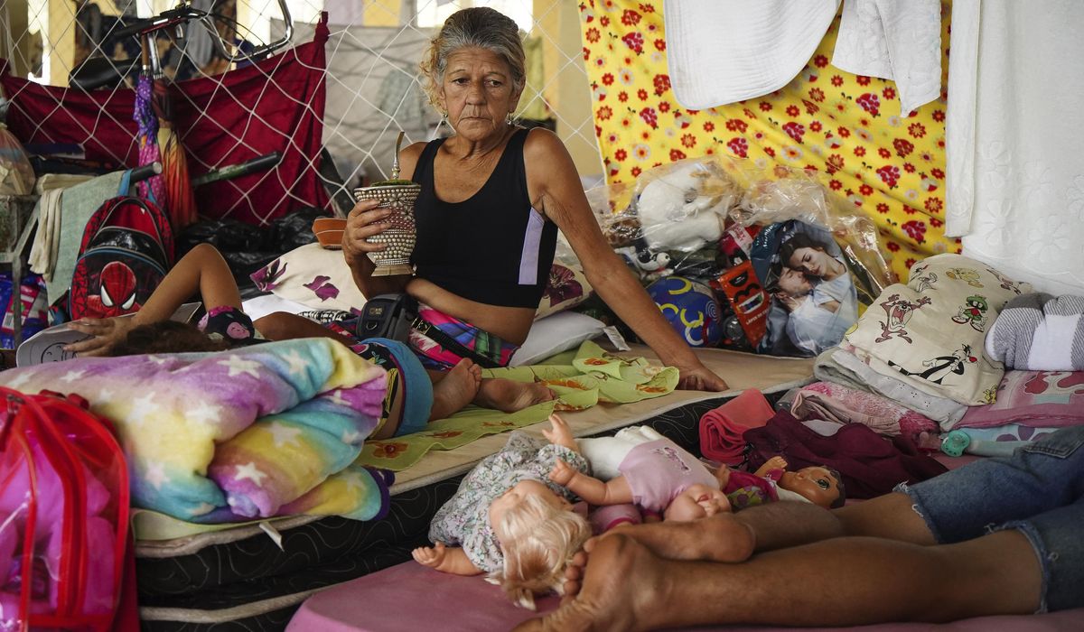 More heavy rain expected in Brazil's south, where many who remain are poor