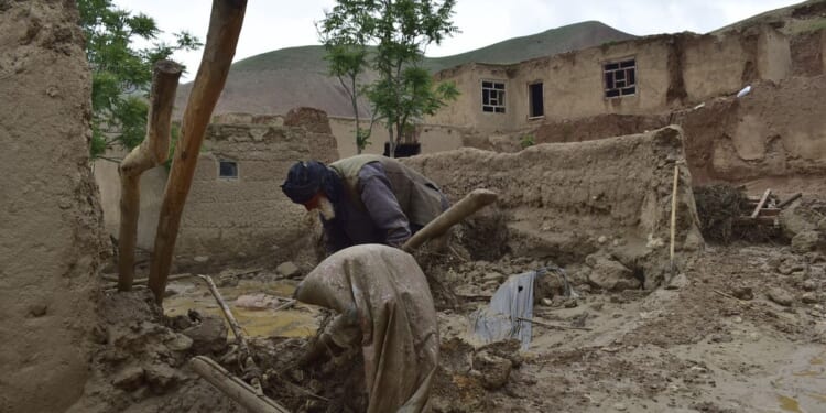 Heavy rains set off flash floods in northern Afghanistan, killing at least 50 people