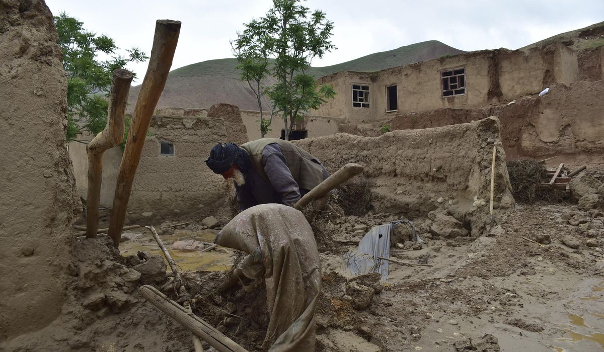 Heavy rains set off flash floods in northern Afghanistan, killing at least 50 people