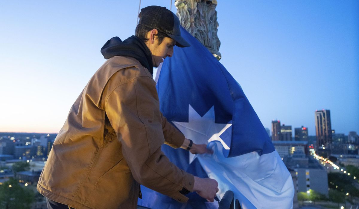 Minnesota unfurls new state flag atop the capitol