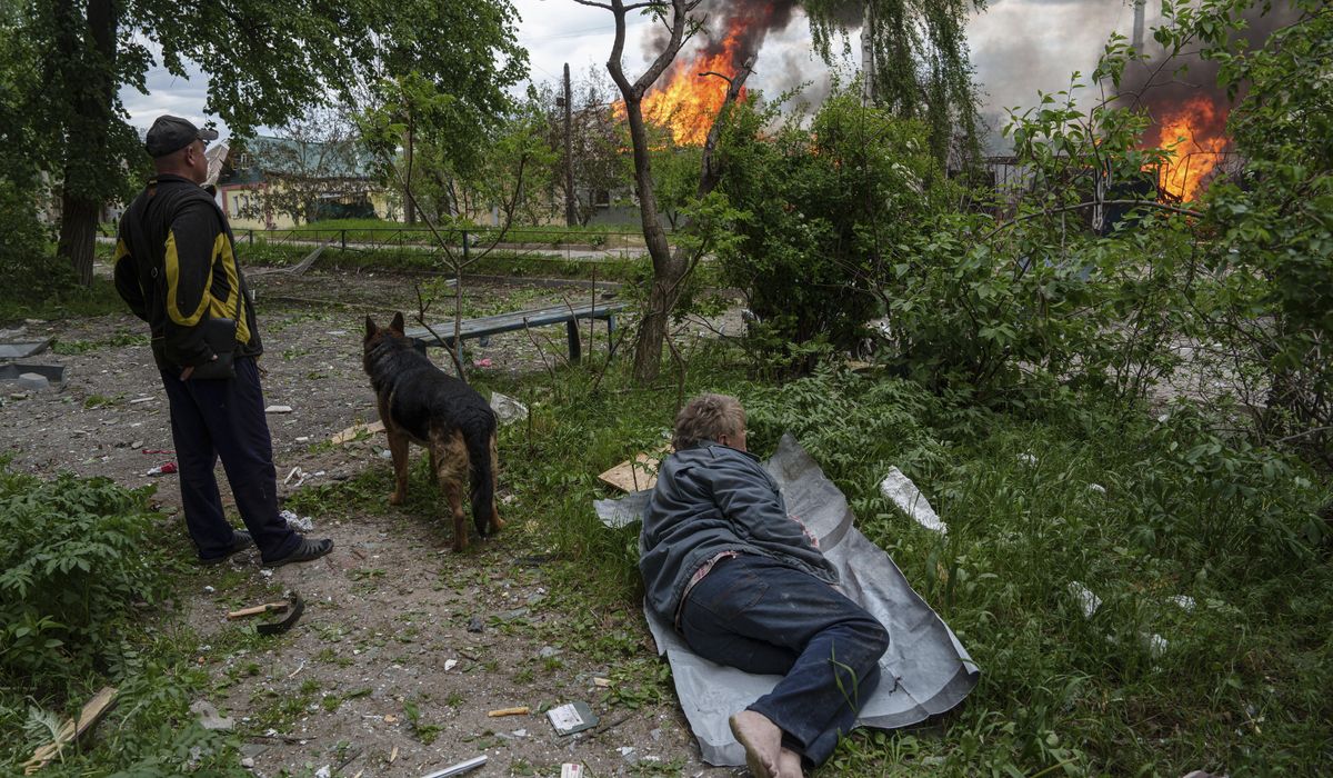 Russia presses renewed border assault and thousands of civilians flee northeast Ukraine