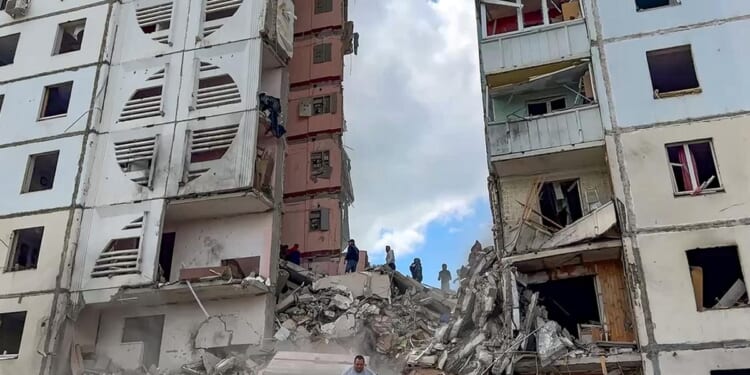 Over a dozen injured after an apartment block collapses in Russian border city after heavy shelling