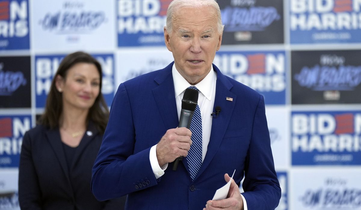 Bishops upbraid Biden for crossing himself at abortion rally