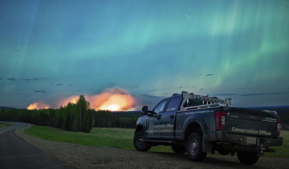 Western Canadian town prepares for possible 'last stand' as wildfires rage