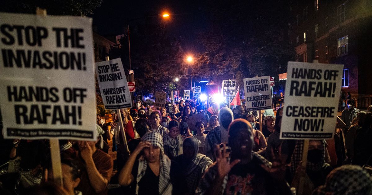 Pro-Palestinian demonstrators march back to George Washington University Tuesday in Washington, D.C. Pro-Palestinian encampments have sprung up at college campuses around the country with some demonstrators calling for schools to divest from Israeli interests amid the ongoing war in Gaza.