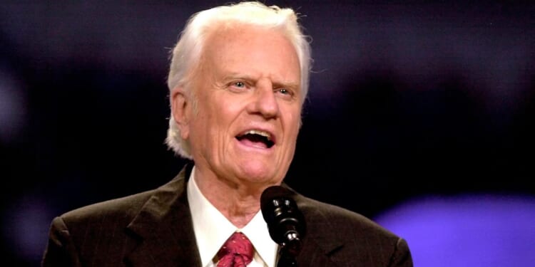 The Rev. Billy Graham speaks during the Mission Metroplex at Texas Stadium in Irving, Texas, on Oct. 17, 2002.