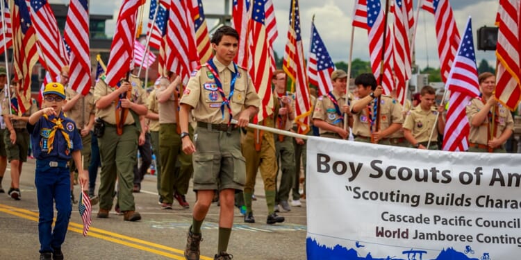 Scouts from Boy Scouts of America take part in the Grand Floral Parade, during Portland, Oregon, Rose Festival in 2019.