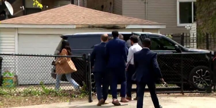 A video from Chicago media appears to show Mayor Brandon Johnson fleeing reporters and preparing to get into a vehicle as they try to ask him questions about fallen officer Luis Huesca. Johnson's office said, however: “That isn’t Mayor Brandon Johnson in the video."