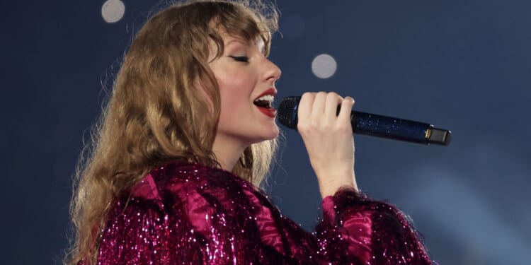 Taylor Swift performs during her "Eras Tour" at the National Stadium on March 2 in Singapore.