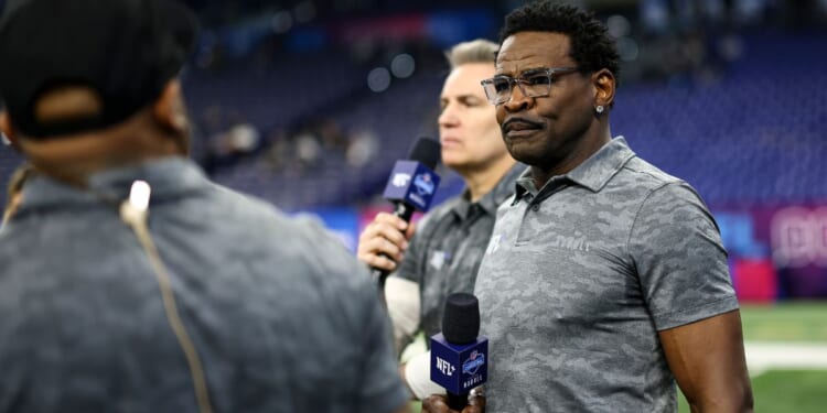 NFL Network personality Michael Irvin broadcasts from the field during the NFL Combine at the Lucas Oil Stadium on March 2, 2024 in Indianapolis, Indiana.