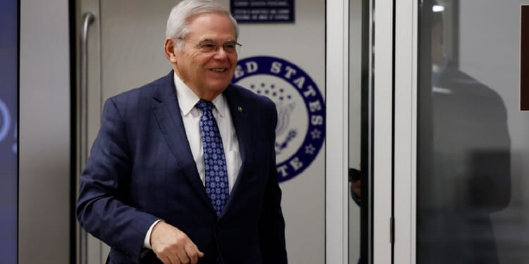 Democratic Sen. Bob Menendez of New Jersey is pictured in a March 22 photo in the Senate Subway of the U.S. Capitol. Menendez faces trial starting Monday on bribery charges.