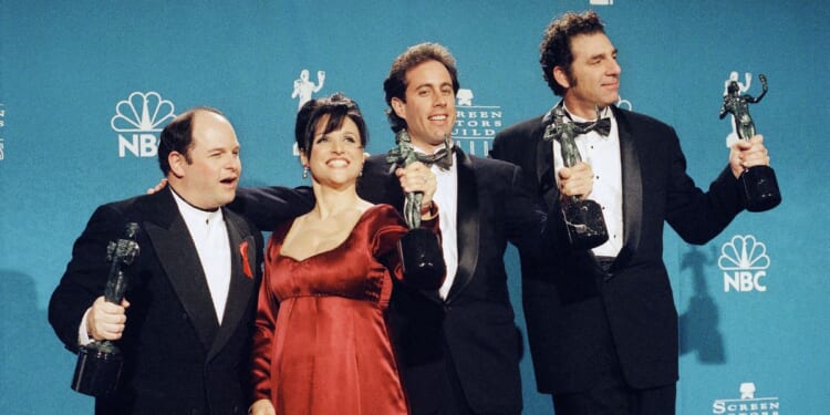 The cast of the 1990s NBC sitcom "Seinfeld" backstage at the Screen Actors Guild Awards in 1997.