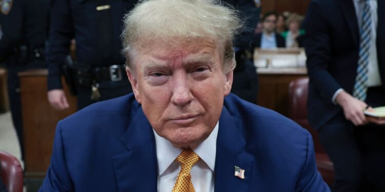 Former President Donald Trump attend his trial at Manhattan criminal court in New York City on Tuesday.