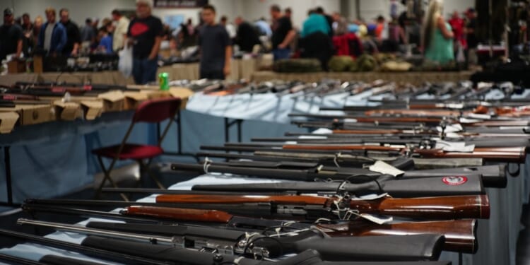 Weapons are on display in a Kansas City, Kansas, gun show in Kansas City, Kansas, in 2016.