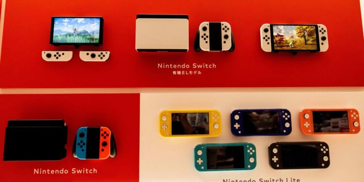 Nintendo Switch systems displayed at a store in Tokyo on February 3, 2022.