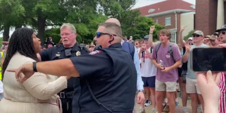 Counter-protesters at Ole Miss jeered at a pro-Palestinian protester who was livestreaming as both sides clashed on Thursday.