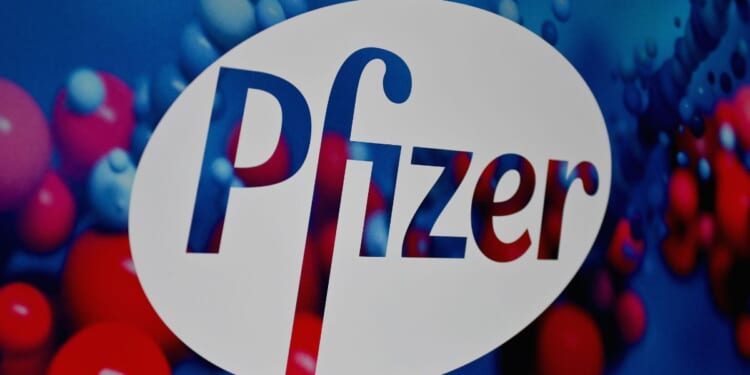 The Pfizer logo is seen at the Pfizer Inc. headquarters in a file photo from December 2020 in New York City.