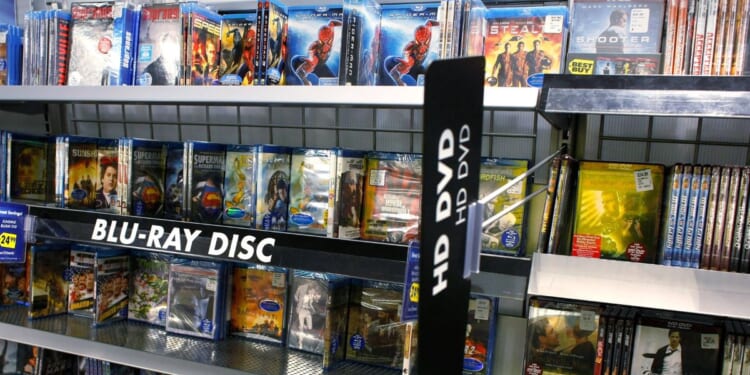 Rows of DVDs and Blu-Ray discs for sale on various shelves at a Best Buy store in San Francisco, California, in 2008.