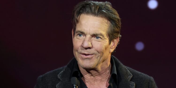 Dennis Quaid, seen in an April photo, portrays former President Ronald Reagan in a new movie opening Aug. 30.