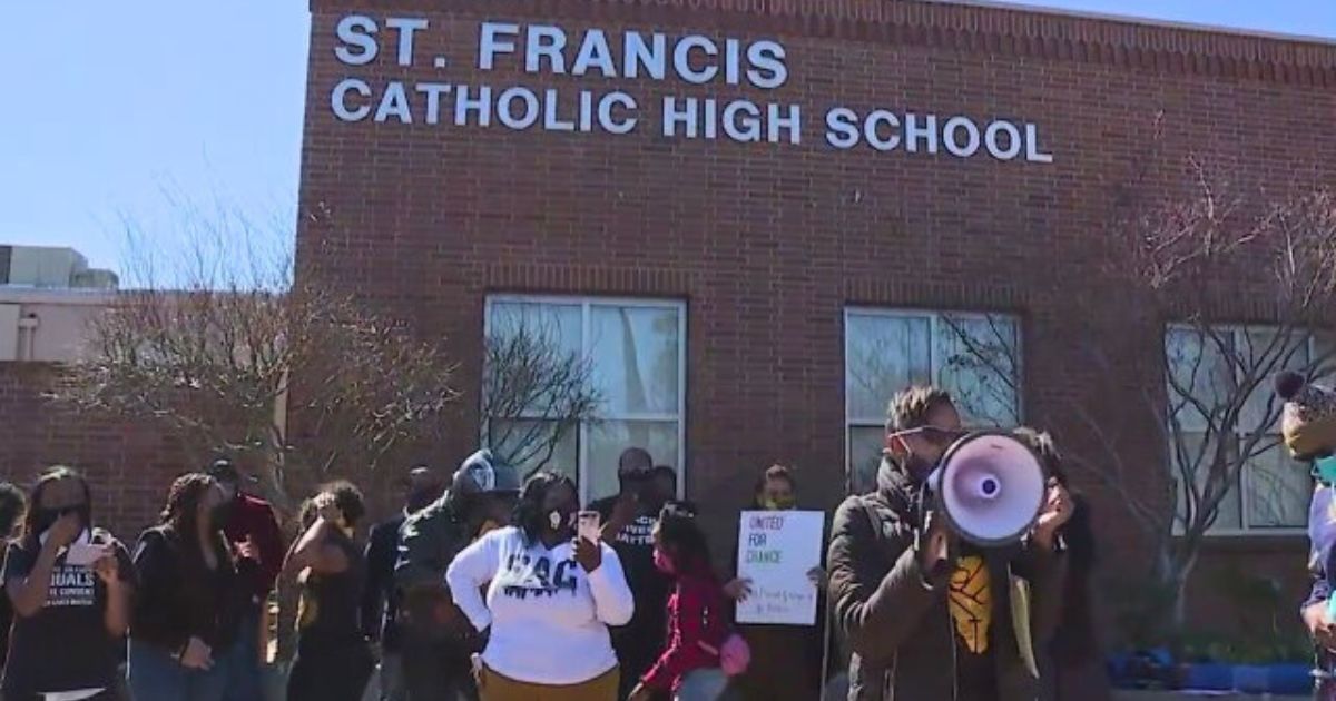 People protest over supposed "blackface" by students at St. Francis High School in Mountain View, California.