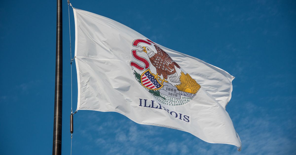 The Illinois state flag flies over Navy Pier in Chicago.