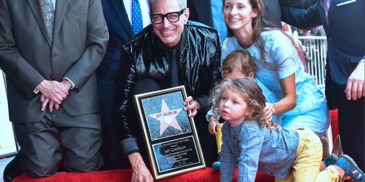 Actor Jeff Goldblum, in a June 2018 file photo, poses with his wife, Emilie Livingston, and children, Charlie, now 8, and River, now 6, near his his Hollywood Walk of Fame star during its unveiling ceremony in Hollywood.